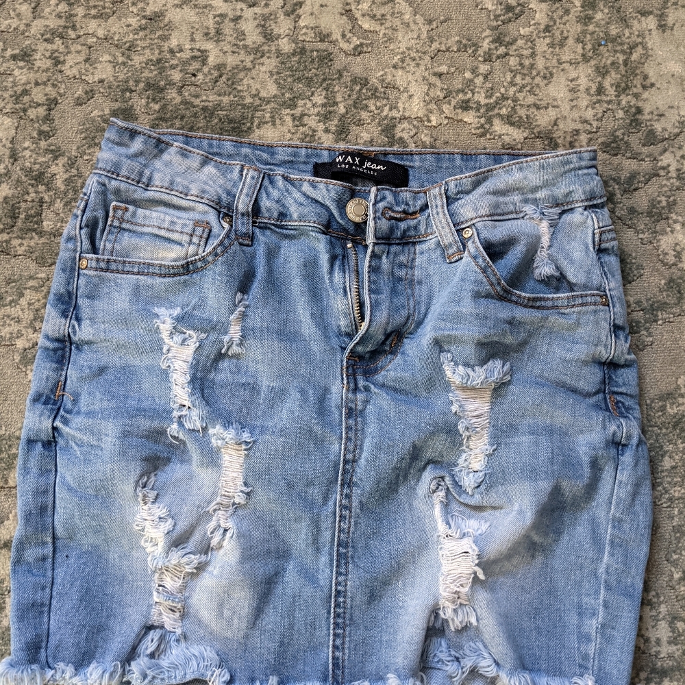 Wax jean distressed jean skirt